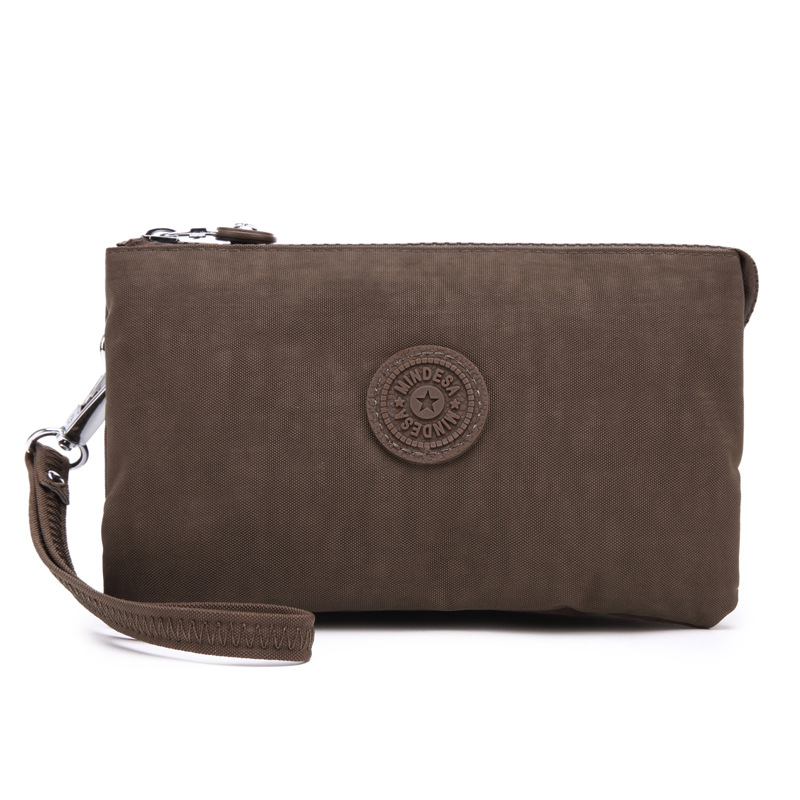 Bolsa de mano de nylon multicapa de gran capacidad a prueba de derrames de agua de mujer simple de moda larga cremallera cambio pasaporte bolso móvil