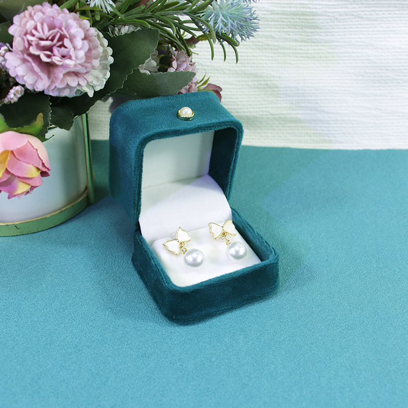 新しいベルベットの布は腰の真珠を収めてアクセサリーの箱の指輪のイヤリングのイヤリングの真珠のネックレスのブレスレットを掛けてお母さんにプレゼントします。