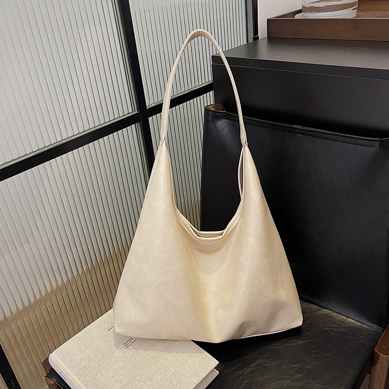 Gran capacidad de moda coreana textura hombro brazalete bolso para mujeres 2025 primavera nuevo estilo minimalista bolso de mujer