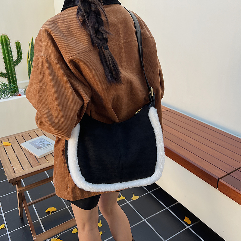 2025 otoño y invierno nuevo estilo retro de cuero de seda bolso de peludo de mujer bolso de cubo de peludo bolso de hombro de color de colisión bolso de mochila versátil