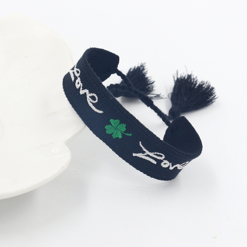 Cross-border European and American four-leaf clover bracelet fashion simple LOVE custom letter ribbon embroidery tassel woven hand rope Cross-border European and American four-leaf clover bracelet fashion simple LOVE custom letter ribbon embroidery tassel woven hand rope