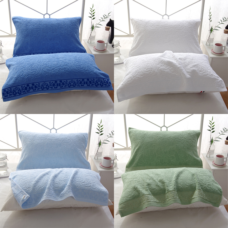 A pair of old-fashioned terry white pillow covers
