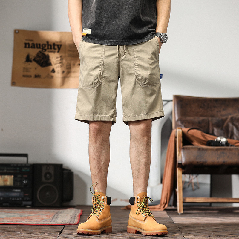 2022 TikTok populares pantalones cortos de cinco puntos pantalones casuales sueltos casuales de los hombres cintura elástica pantalones de playa suministro de entrega de una sola pieza