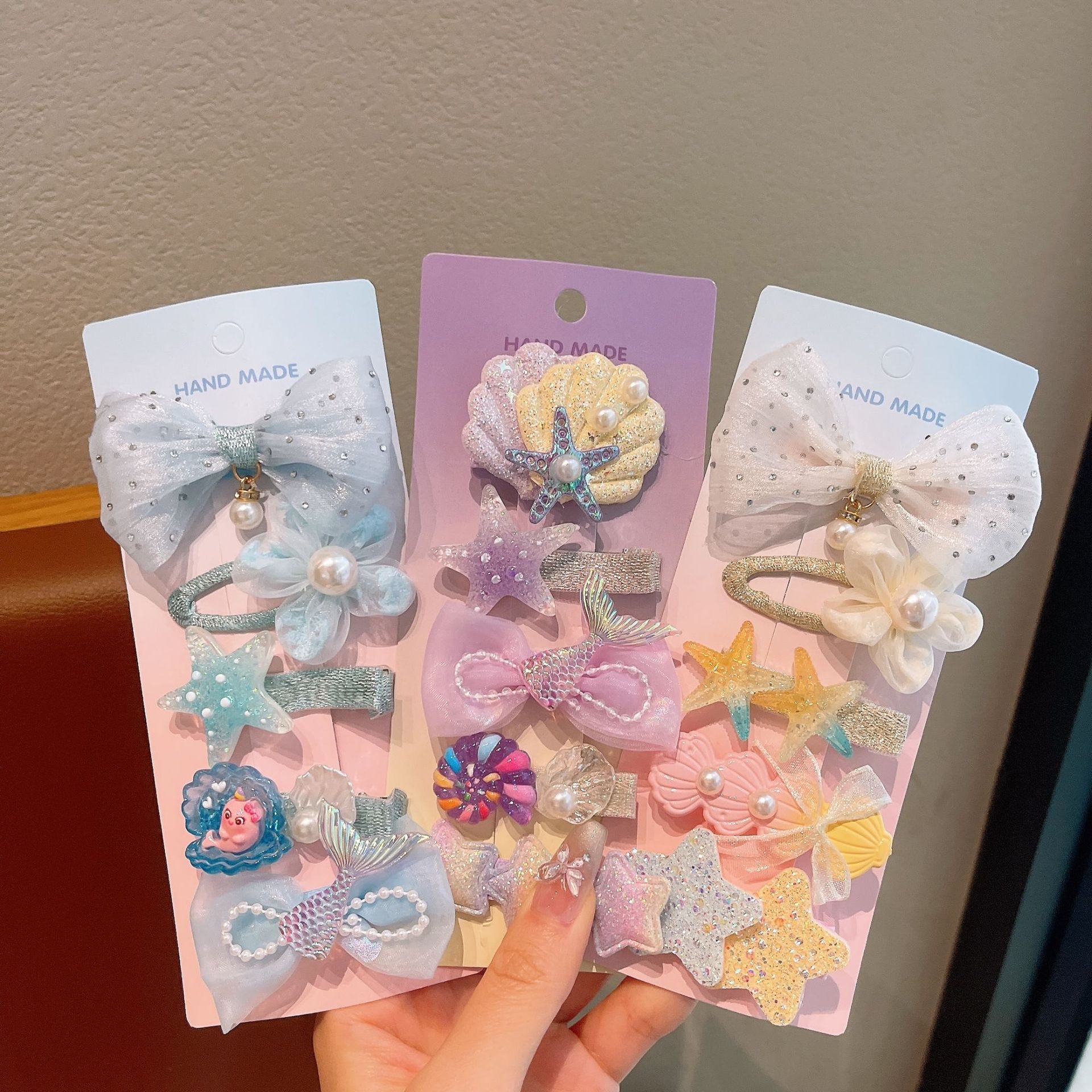 Nuevo niño concha sirena clip para el cabello niñas vacaciones tarjeta de pelo de viento niñas rotas clip para el cabello perlas transparentes