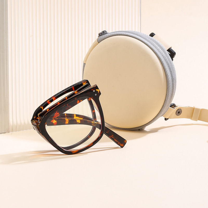 Gafas de lectura portátiles y modernas con filtro de luz azul, montura ovalada plegable, suministro directo de fábrica para personas mayores, gafas de lectura de visión única.