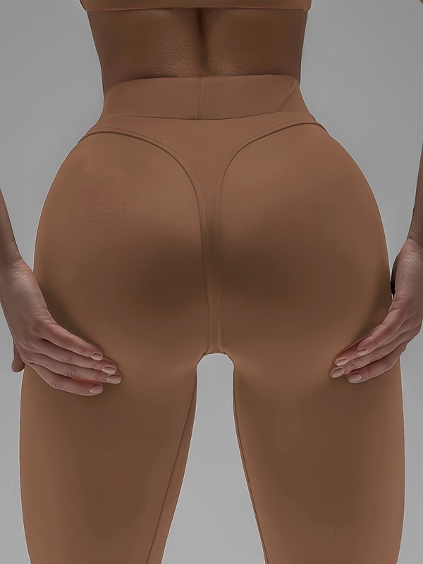 女性のスポーツヨガトライアングルタイトパンツハイウエストとヒップ|undefined