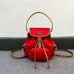 miu Miu 2025 新しいカジュアルキャンバスバックパックカレッジスタイルレトロバックパック大容量ショルダーレディースバッグトレンディ