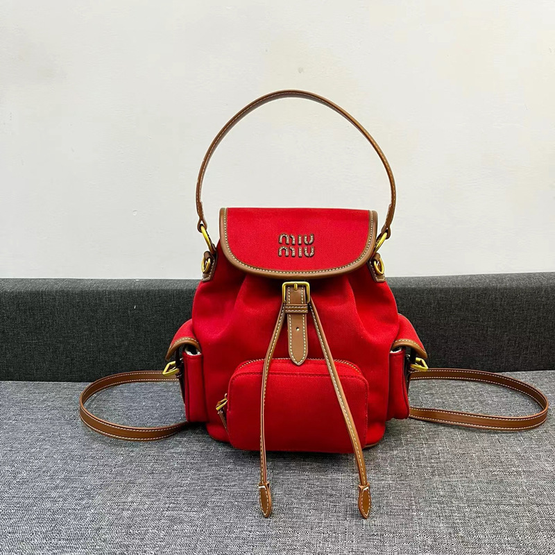 miu Miu 2025 新しいカジュアルキャンバスバックパックカレッジスタイルレトロバックパック大容量ショルダーレディースバッグトレンディ|undefined