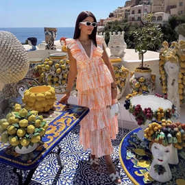 澳洲小众度假风长裙2025春夏新款V领飞飞袖蛋糕裙长款印花连衣裙