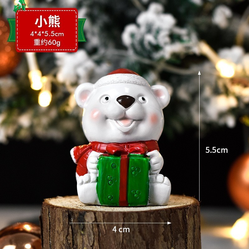 クリスマスの樹脂のデスクトップの置物は彼女にプレゼントします。|undefined