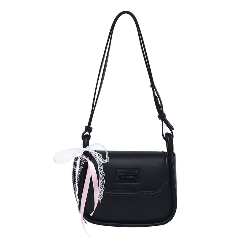 Bolsos de cercanías de nicho de ocio para mujer 2025 nueva primavera y verano bolso de hombro de diseño simple moda bolso de mensajero de todo fósforo