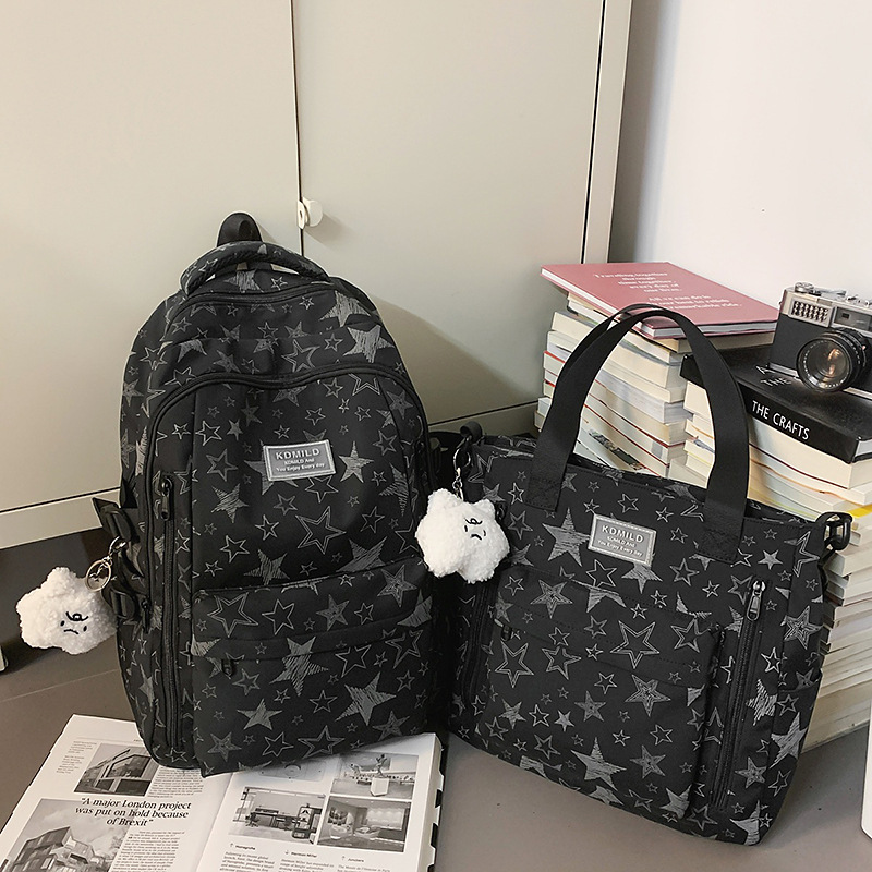 Cross-border 2026 nicho universal estrellas auriculares mochila de gran capacidad mochila de graffiti de viaje de estudiantes universitarios
