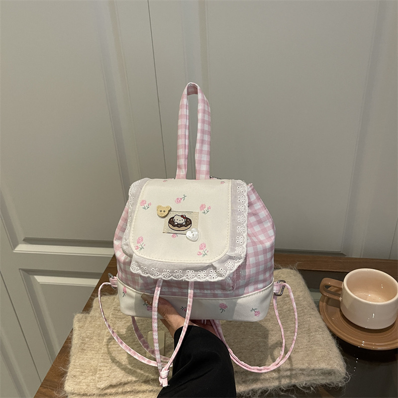 Japón dulce puro deseo mochila de encaje 2025 nueva chica coreana encantadora viaje flor pegatinas mochila pequeña