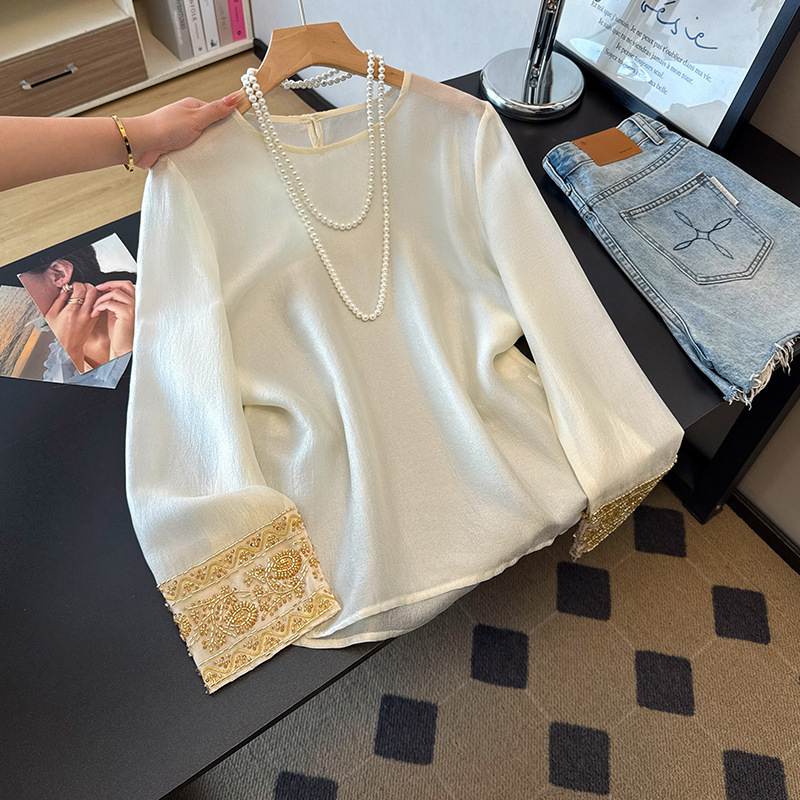 2026 Spring New Gentle Off-White Round Neck Shirt with Intricate Gold Bead Embroidery on the Cuffs, Glossy Tencel Top for Women 2026 Spring New Gentle Off-White Round Neck Shirt with Intricate Gold Bead Embroidery on the Cuffs, Glossy Tencel Top for Women