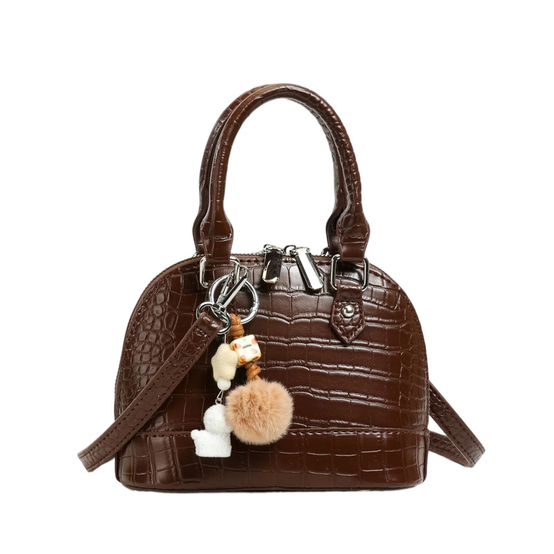 Verano estampado de piedra sensación diaria bolso de mano para mujeres 2026 nueva moda viaje bolsa de hombro bolsa de concha de tramo inclinado