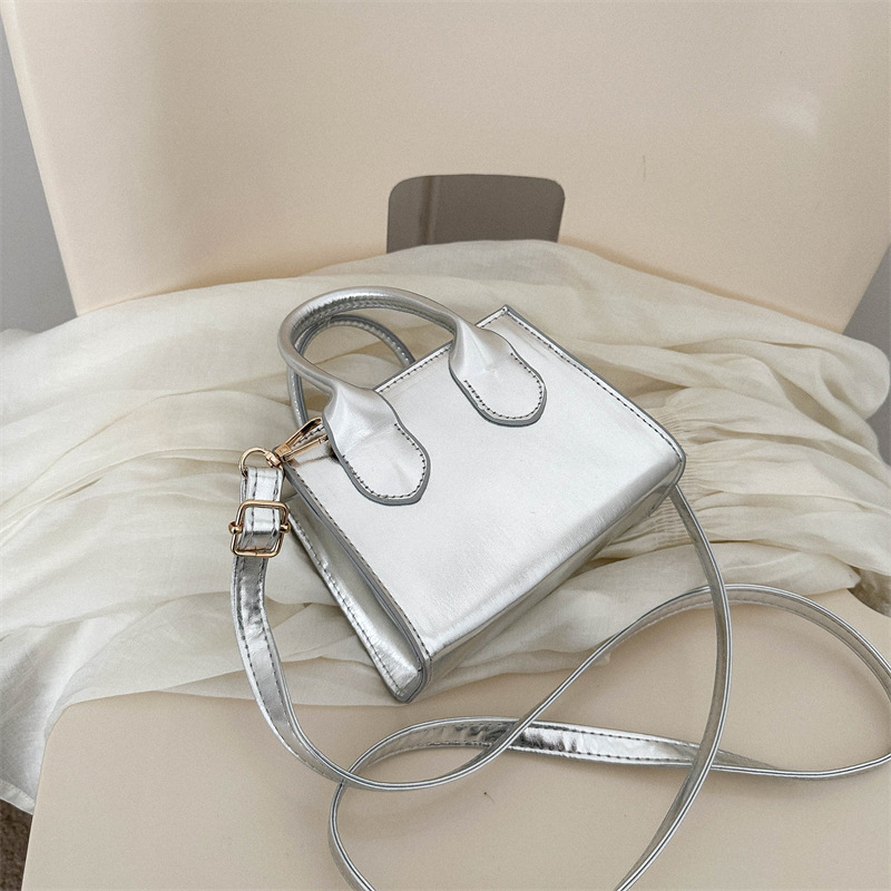 Popular bolso de alta calidad joven dama fresca viajero pequeño bolso cuadrado 2023 nuevo nicho bolsa de mensajero