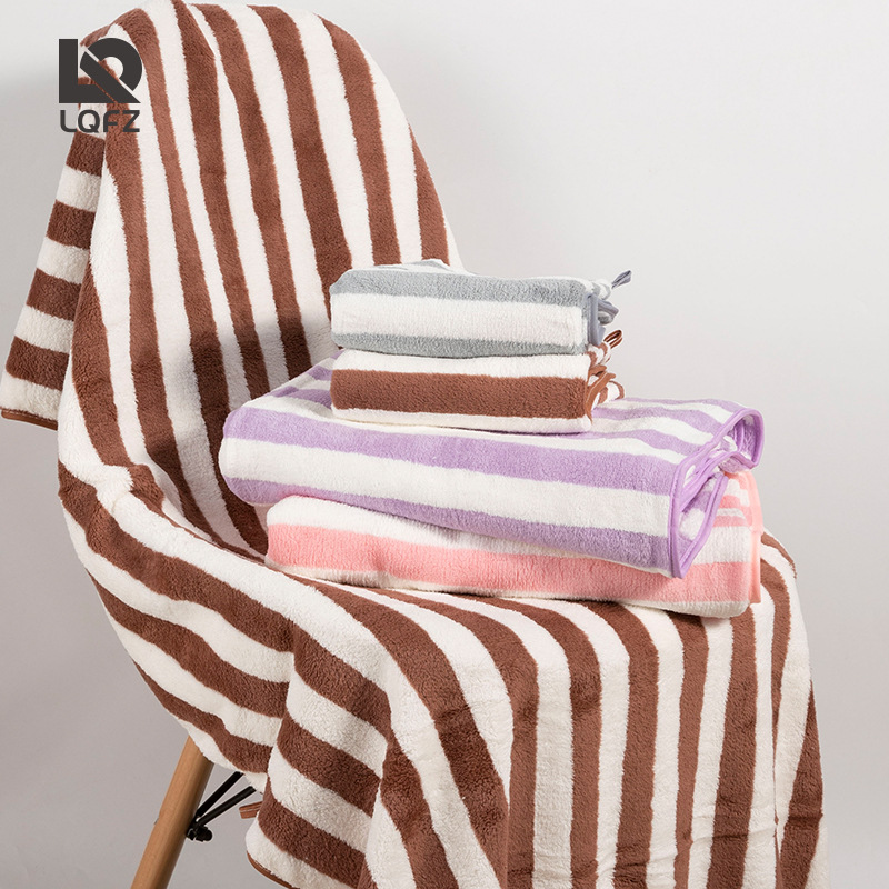 Toalla de baño a rayas de lana de coral hogar adulto fuerte absorbente de secado rápido Toalla de abrigo de bebé Toalla de playa Toalla de baño al por mayor