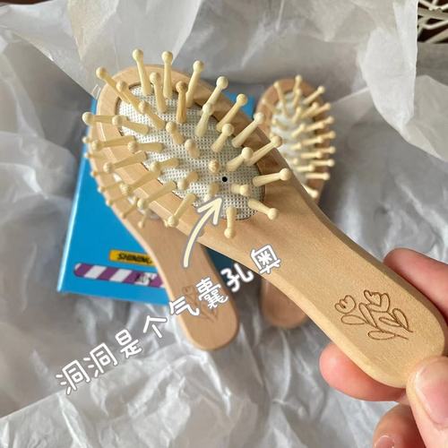 Amazon exports European and American bagged tulip lotus wood leather massage comb portable comb air cushion comb