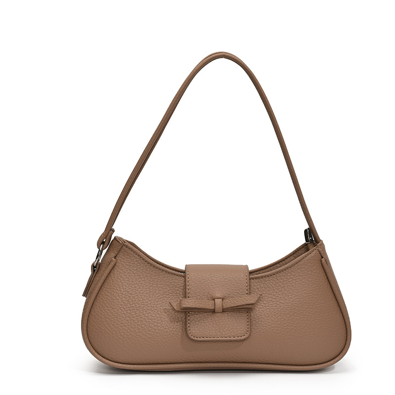 Versión coreana del bolso de axila de nicho 2025 primavera y verano nuevo bolso femenino lindo bolso de lazo bolso de hombro diario