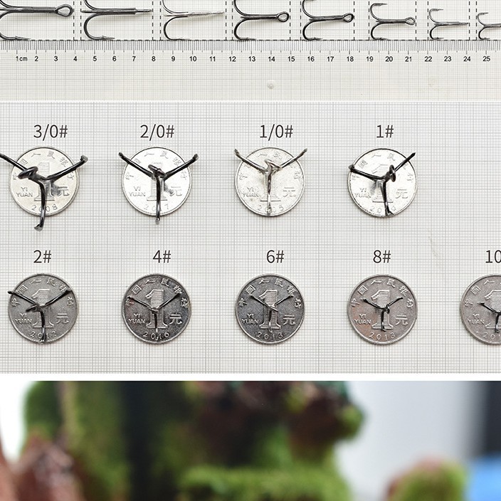 QIHU 1215 boutique de sangre a través de tres ganchos Super Blue antioxidante negro níquel plata Luya tres gancho de anclaje boca recta peces grandes pesca de mar