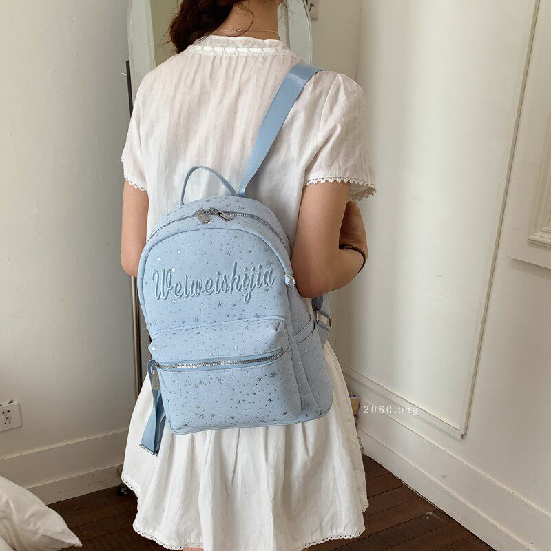 Mochila de moda mochila 2026 mochila de gran capacidad para estudiantes universitarios en clase nueva primavera bolsa de letras lienzo para mujeres