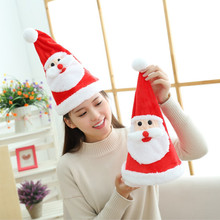 新跨境电动圣诞老人帽子毛绒玩具会唱歌发光摇摆大小可调厂家批发