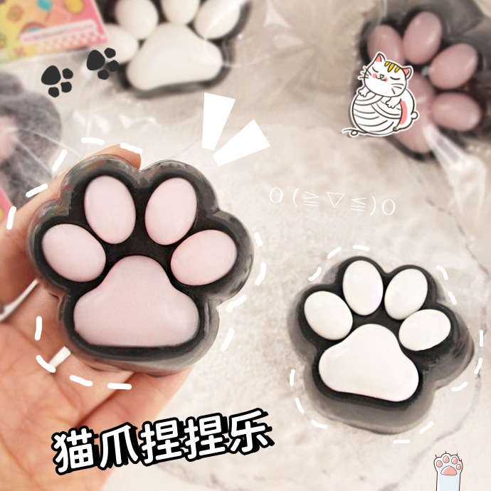 El negro es un gran pellizco de garras de gato, el corazón de la niña tiene un alto valor facial, el artefacto de descompresión, el pegamento blando tpr, el rebote lento, el pellizco de barro.