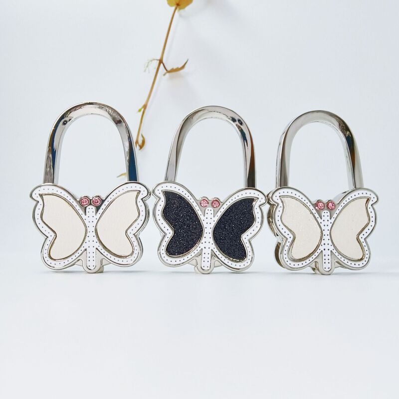 In-stock direct wholesale from the manufacturer: innovative storage device, butterfly-shaped adhesive-free foldable table-top bag hook, handbag hanger