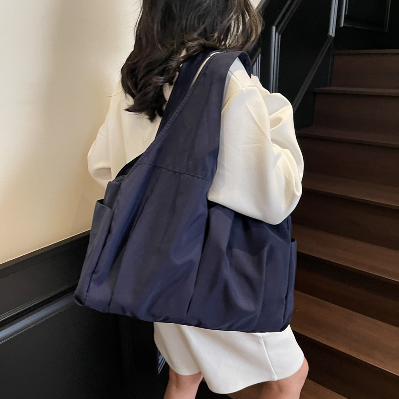 大容量单肩包包女2025夏新款简约设计托特包上班通勤腋下包女包