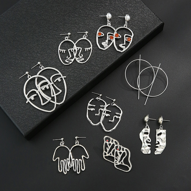 Fashion Creative Hollow Portrait Alloy Drop Earrings Set display picture 1