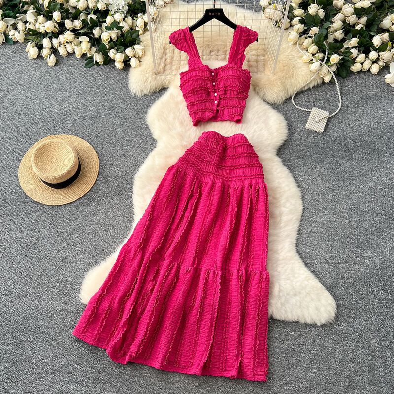 Age-Reducing and Fresh Spring-Summer Resort Style Short Flutter-Sleeve Camisole Top + High-Waisted Pleated Skirt Two-Piece Set Age-Reducing and Fresh Spring-Summer Resort Style Short Flutter-Sleeve Camisole Top + High-Waisted Pleated Skirt Two-Piece Set
