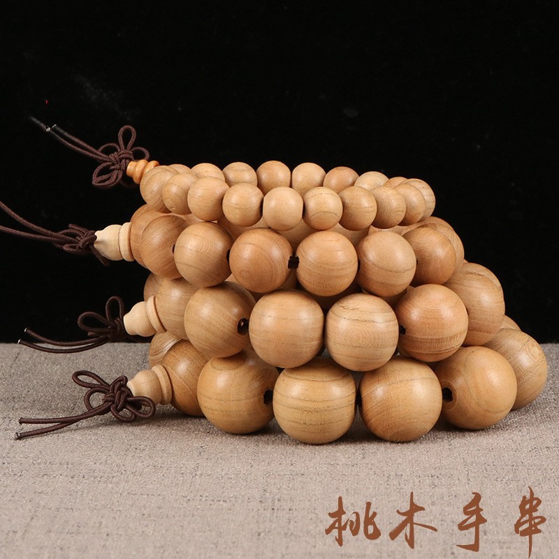 carved rosary with round beads