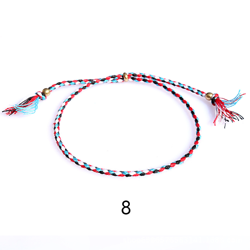 Amazon popular colorido cuerda de algodón amistad pulsera perlas de cobre borla pulsera tejida a mano ajustable hombres y mujeres pulsera