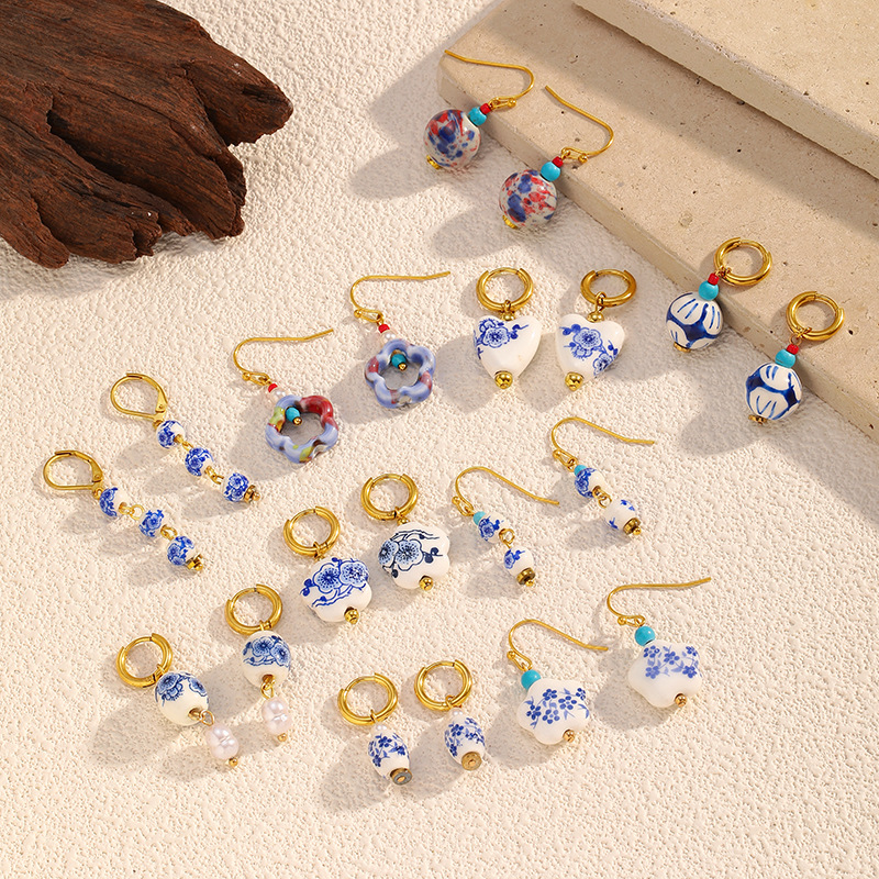 Europa y los Estados Unidos más vendidos antiguos aretes de cerámica azul y flor serie de aretes de cerámica nuevos aretes de estilo chino diseño temperamento estilo anillo redondo