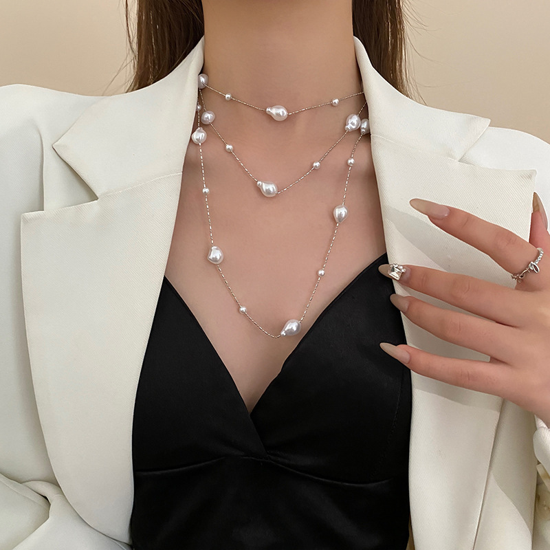フランスのレトロなツバキの花の真珠のネックレスの東大門の蝶の花のペンダントの鎖の鎖の軽い贅沢な高級感の首の鎖|undefined