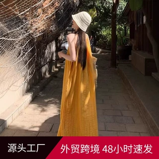 2026新款法式流苏黄色吊带连衣裙高级感海边度假宽松休闲沙滩长裙