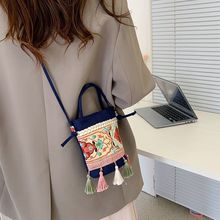 流苏民族风流苏斜挎零钱包2023夏新款森系女包绣花布包水桶手机
