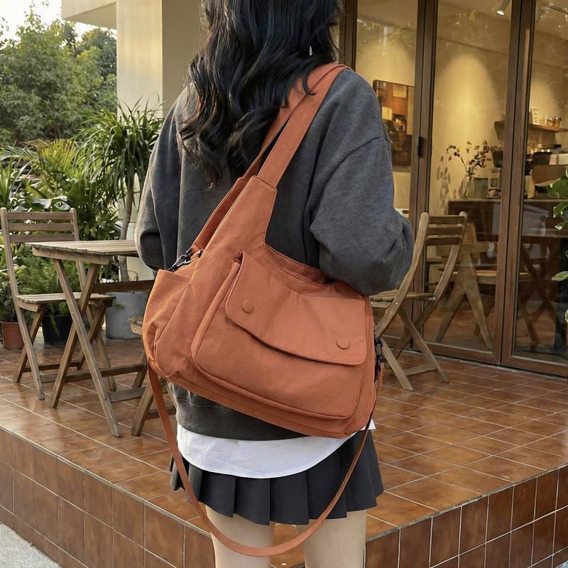 Girls' Caramel Brown Textured Tote Bag with a Casual Vibe, Relaxed Aesthetic, Suitable for Commuting, Casual Use, Lightweight and Versatile Shoulder Bag Girls' Caramel Brown Textured Tote Bag with a Casual Vibe, Relaxed Aesthetic, Suitable for Commuting, Casual Use, Lightweight and Versatile Shoulder Bag