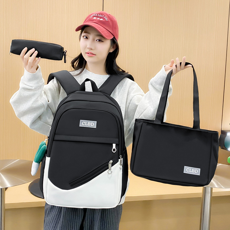 Nueva mochila escolar para mujeres de gran capacidad estudiantes de primaria 3456 grados mochila para estudiantes de secundaria secundaria del campus mochila portátil para hombres