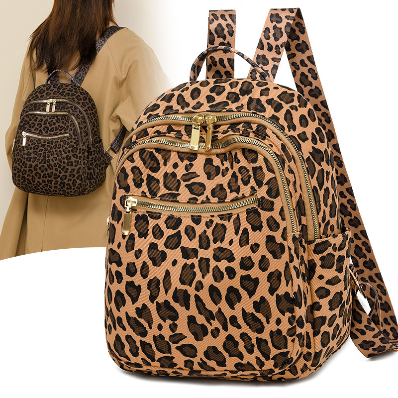 Mochila transfronteriza con estampado de leopardo súper fuego para mujer 2024 nuevo estilo salvaje para mujer mochila casual de gran capacidad bolso de viaje de moda