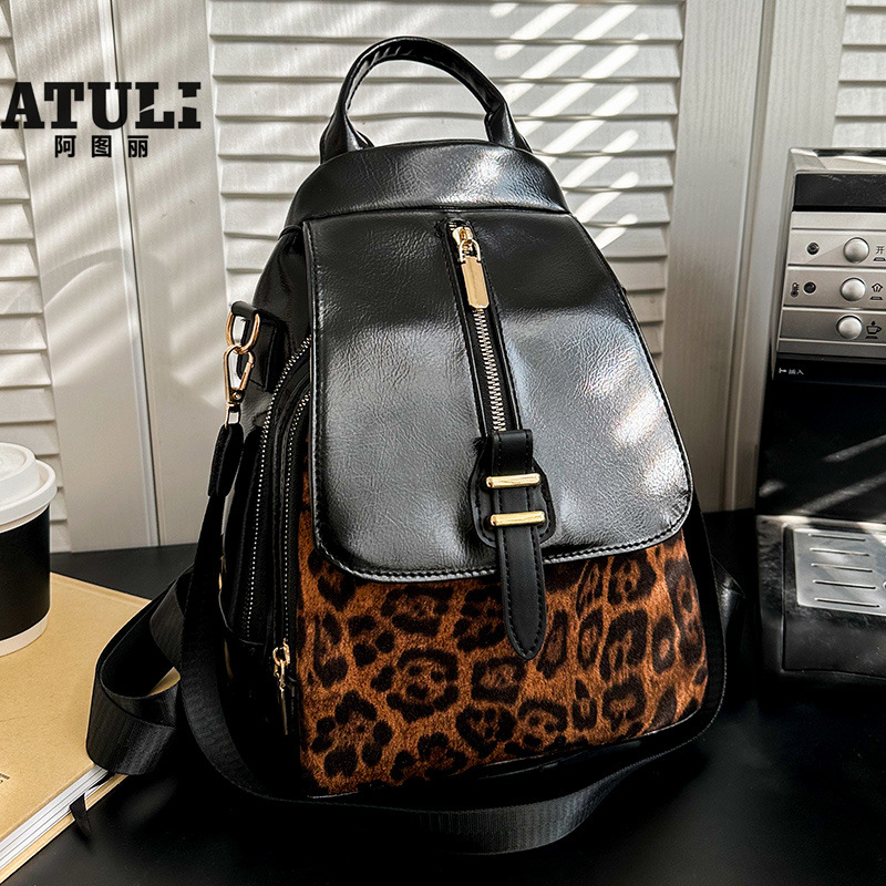 2025 primavera nuevo comercio exterior retro mochila casual impresión de tendencia de contraste de color moda al aire libre versátil gran capacidad
