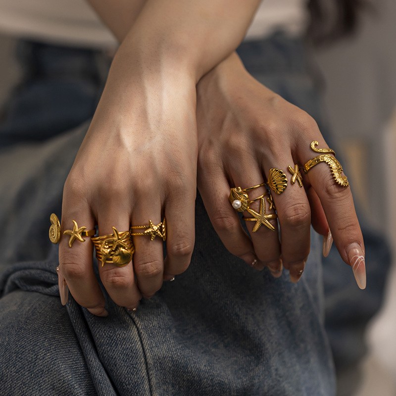 Anillo de acero inoxidable europeo y americano de diseño de nicho femenino conchas anillo de moda para mujeres joyerías
