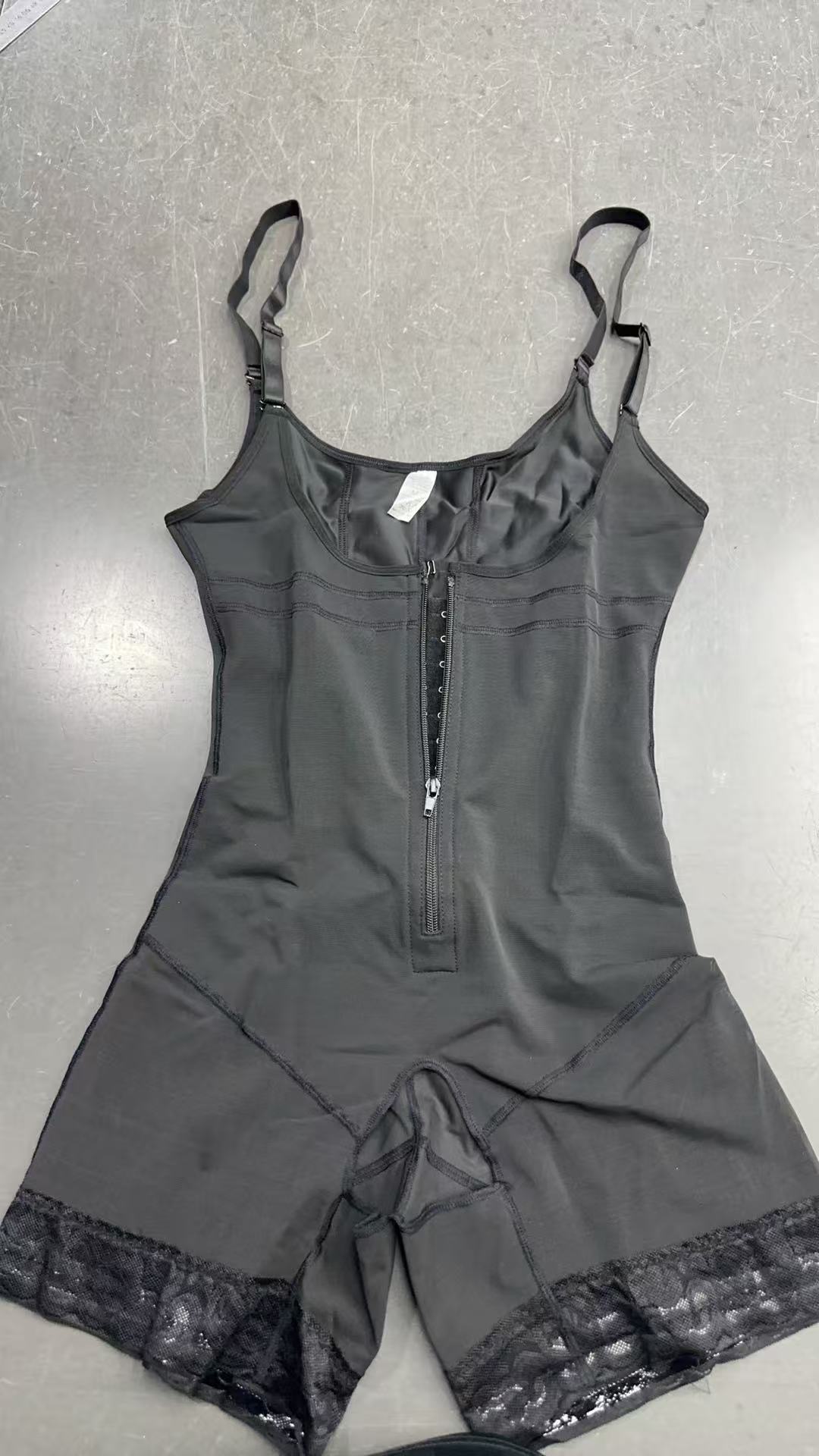 Pantalones de modelado de vientre de cintura alta europeos y americanos pantalones de conformación de cuerpo pantalones de levantamiento de cadera de contracción de vientre pantalones de encaje cremallera corsé Honda ropa interior de una pieza
