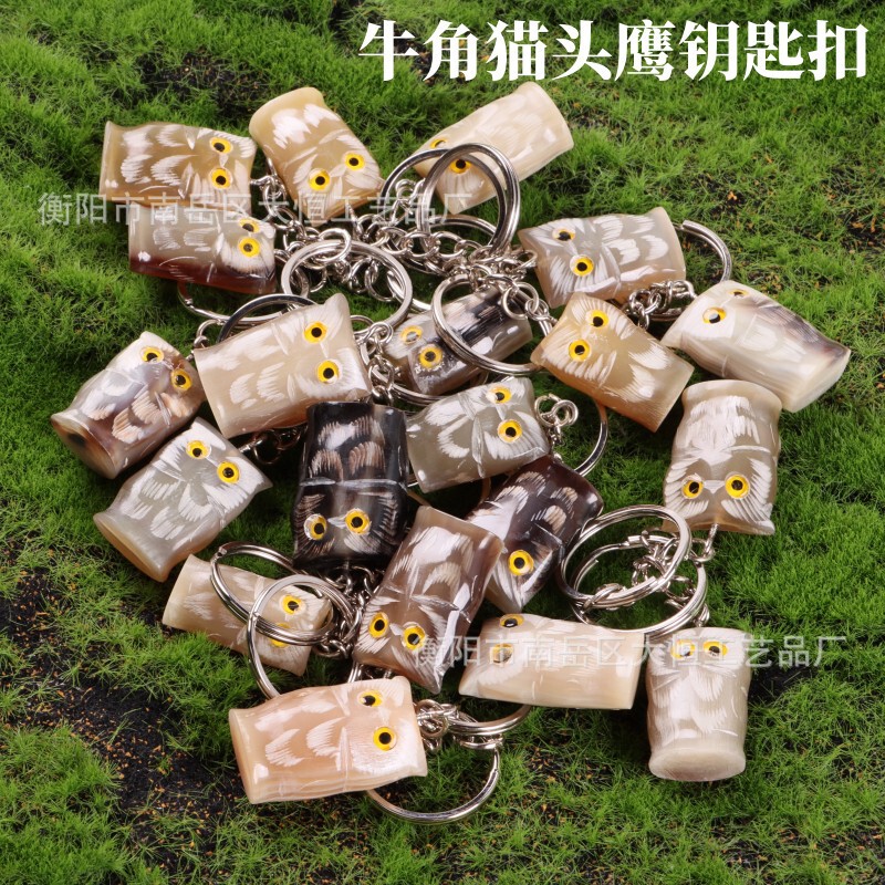 露店の多いデザインの彫刻動物の小さいペンダントのステンレスのキーホルダーの牛の角のキーホルダーの小さい贈り物の卸売り|undefined