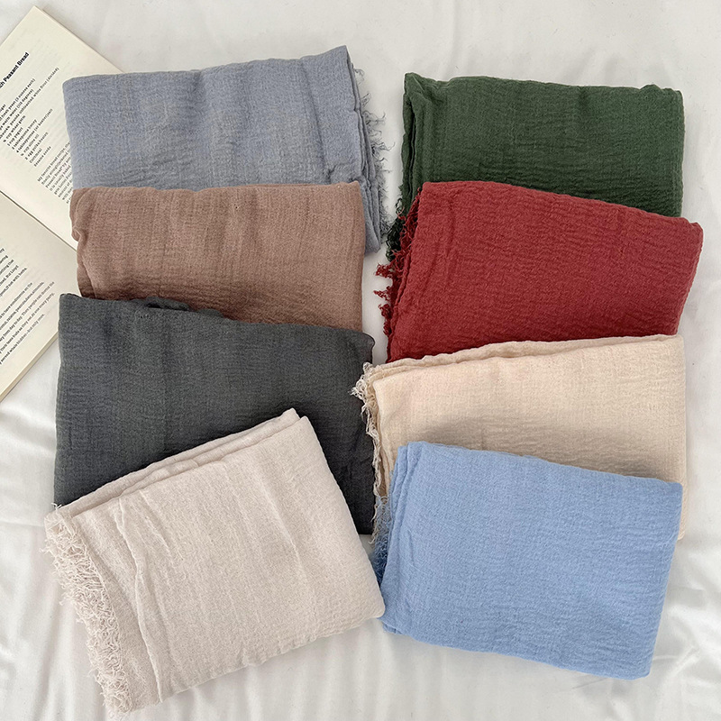 Otoño y invierno bufandas mujeres 2025 nuevo estilo largo de color sólido de alta calidad cuello bufandas cálidas bufandas al por mayor