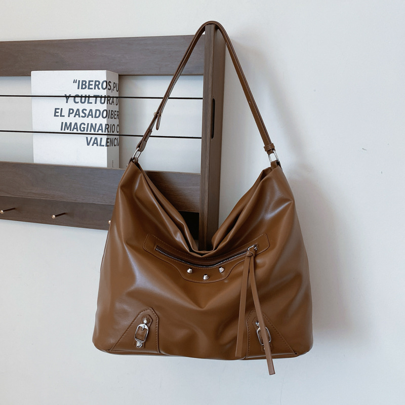 Bolso de gran capacidad para mujeres 2025 nueva moda popular de viaje de hombro mochila cubo tote simple versátil