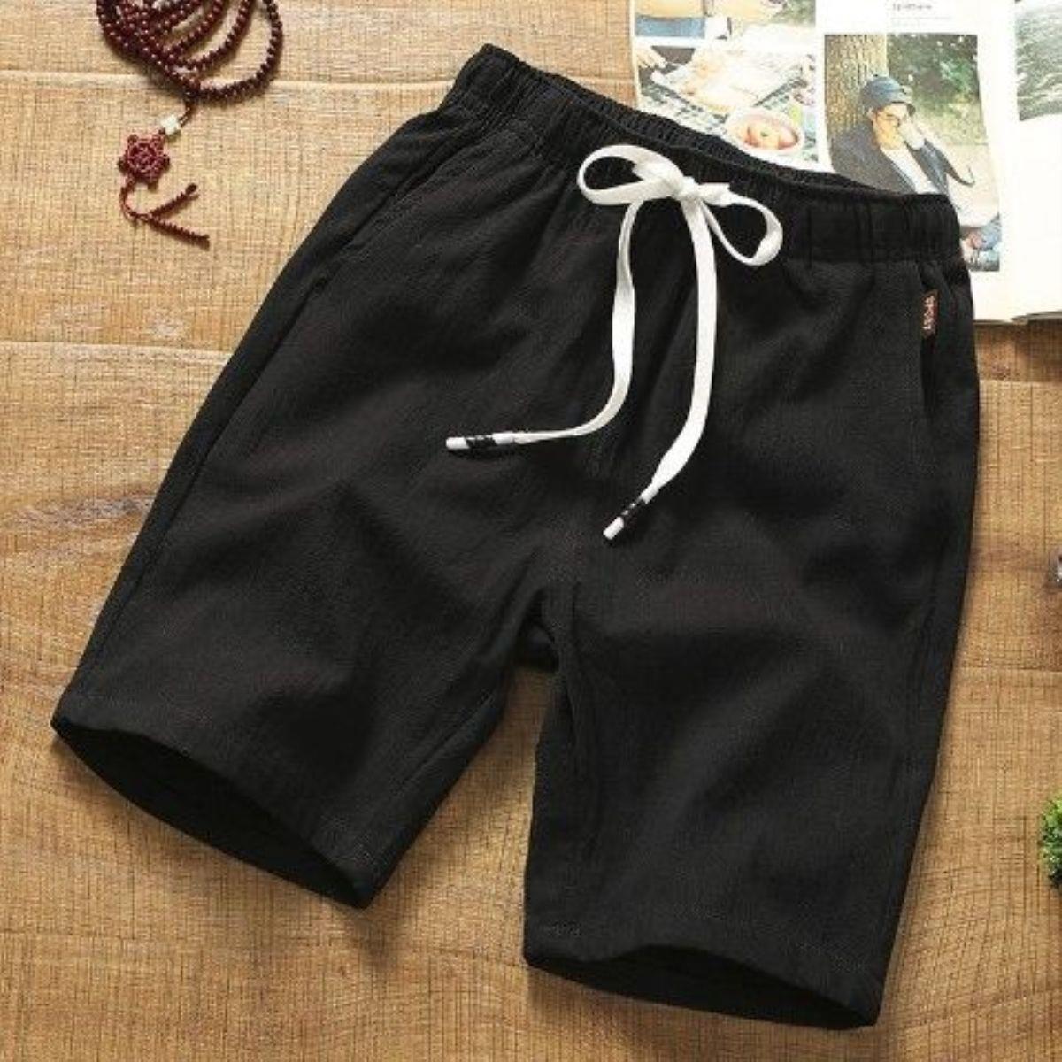 Pantalones cortos casuales pantalones finos de cinco puntos de algodón y lino para hombre, pantalones sueltos de color sólido, pantalones de todo fósforo, estilo coreano, hermosos pantalones cortos de playa, marea