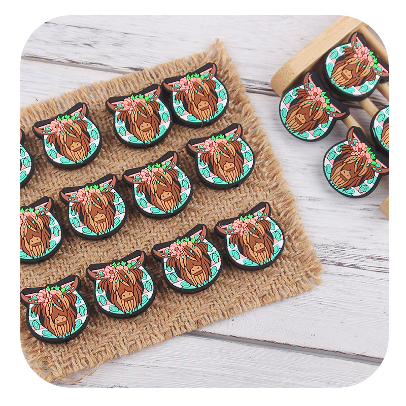 Productos creativos para bebés DIY dibujos animados cabeza de toro de silicona molar juguetes de pulsera de dientes de diente joyería accesorios