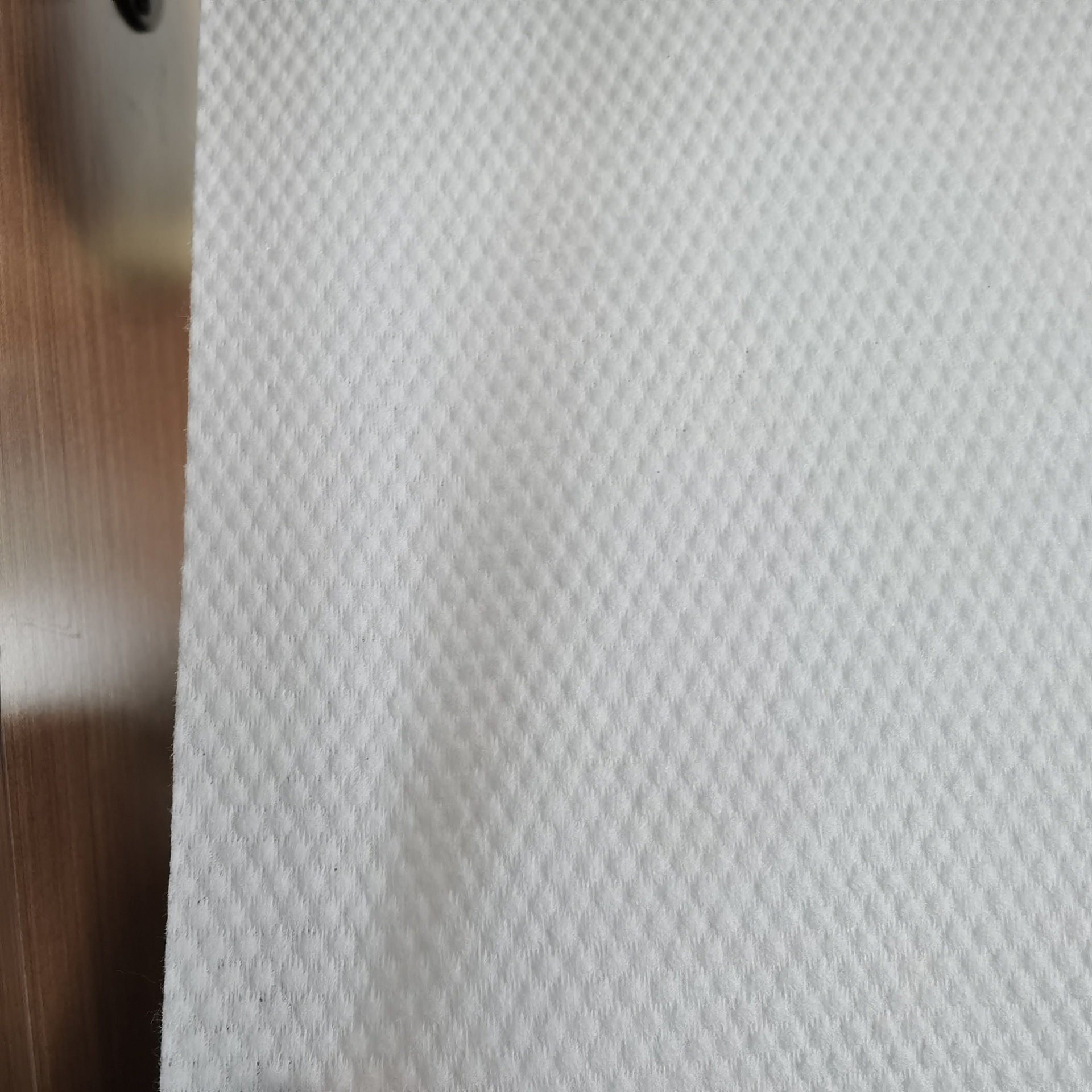 干湿卸妆巾布白色木浆涤纶水刺无纺布水刺无纺布网纹工厂原材料