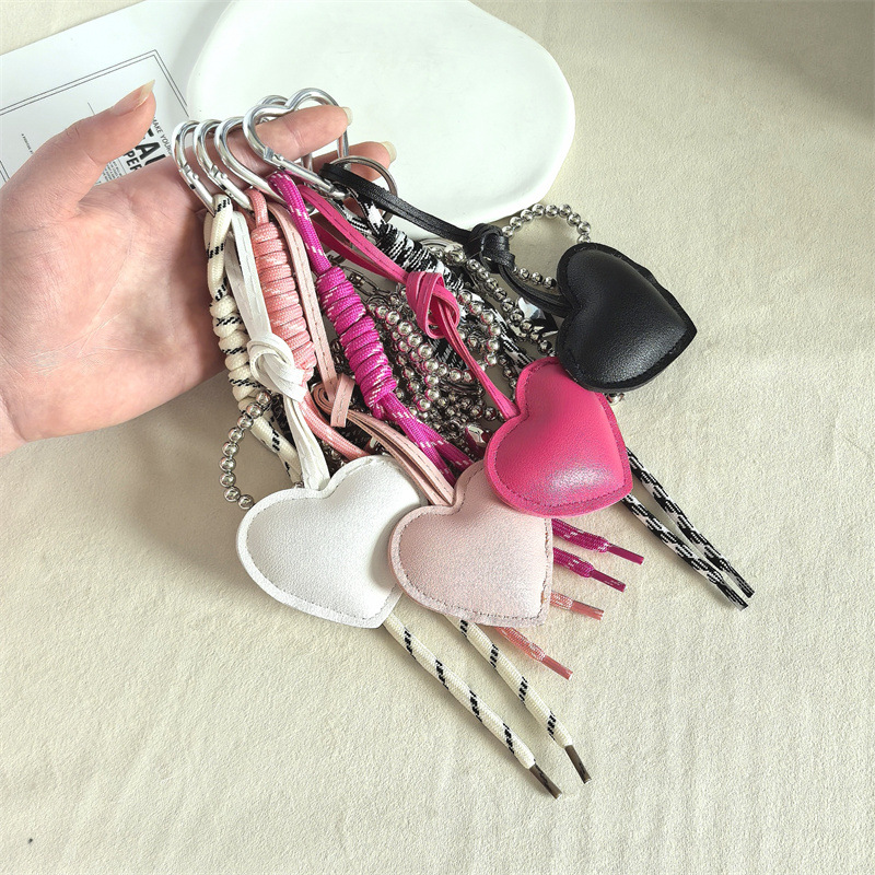 Personalidad transfronteriza PU cuero amor llavero bolso femenino colgante mochila escolar creativa llavero accesorios colgantes al por mayor